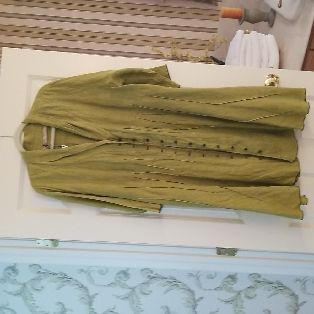 Dress with buttons down the front and a tie in the back to draw in waist!